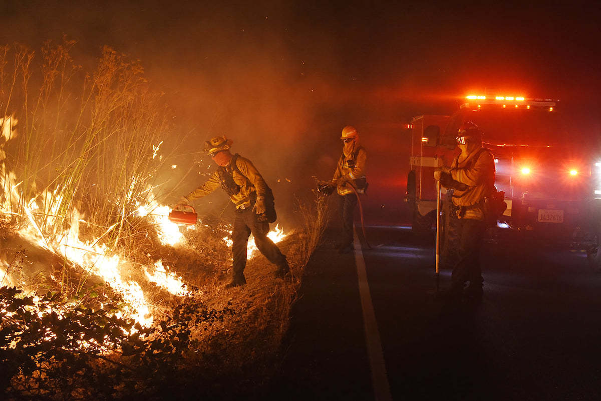 Healdsburg Fire Crew holding the fire from crossing calistog rd. at Badge rd.